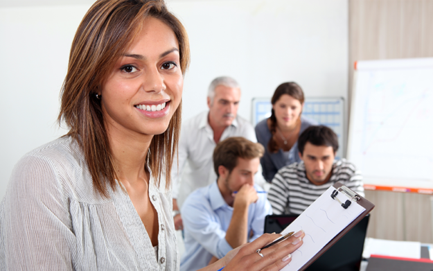 business-formation-image Business woman with brown hair holds a clip board while discussing business formation letting you know that LAWYER attorney Shane Zisman can help you file All forms of paperwork to form your business