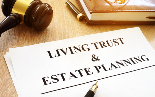 Sign which says Living Trust and Estate Planning letting you know that Attorney Lawyer Shane Zisman specializes in wills, trusts and estate planning