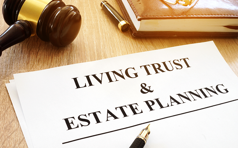 Sign which says Living Trust and Estate Planning letting you know that Attorney Lawyer Shane Zisman specializes in wills, trusts and estate planning