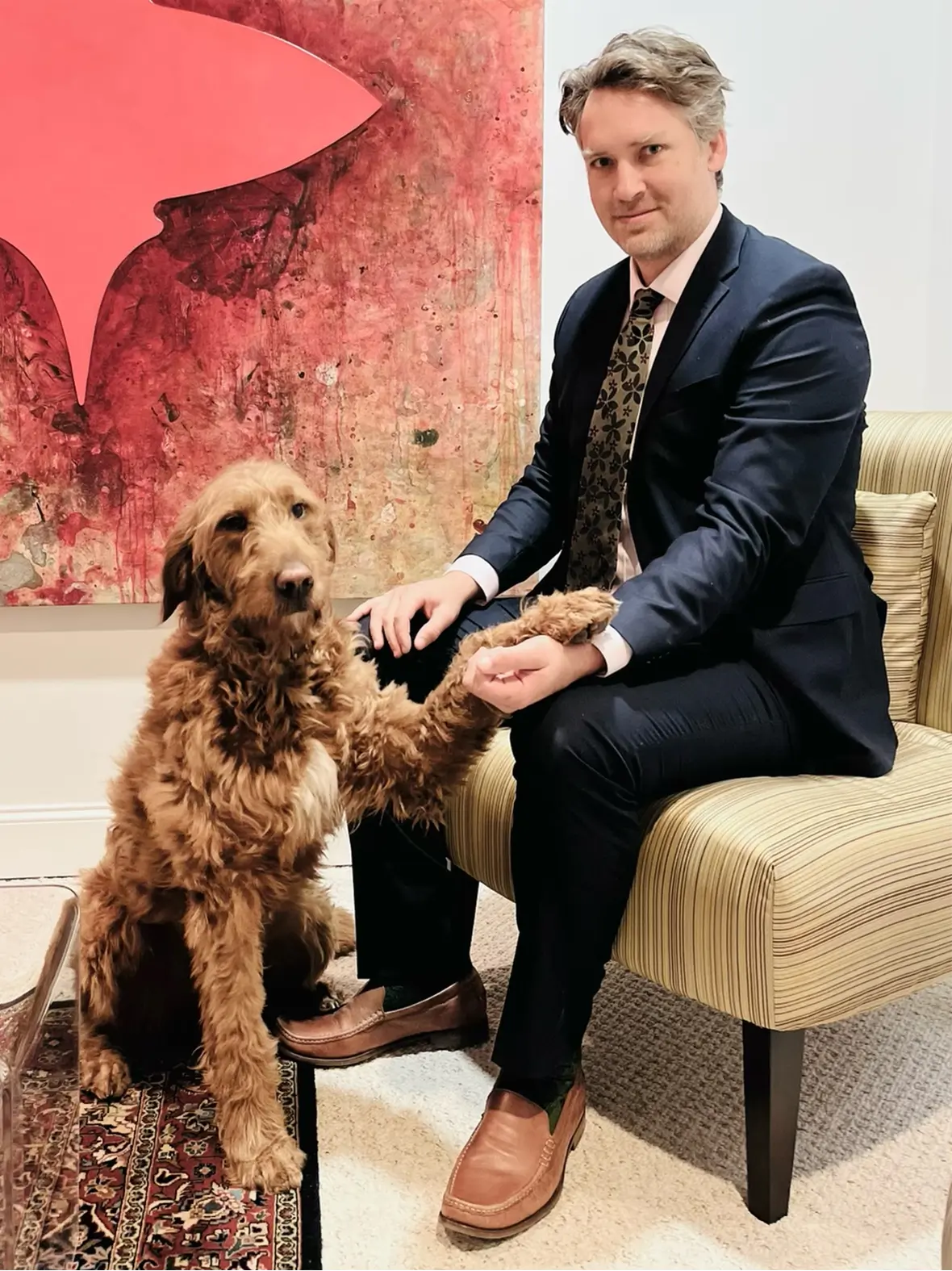 Attorney Shane Zisman with his dog, Rufus