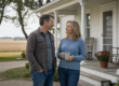 Iowa couple talking on the front path of their farmhouse, calm and settled